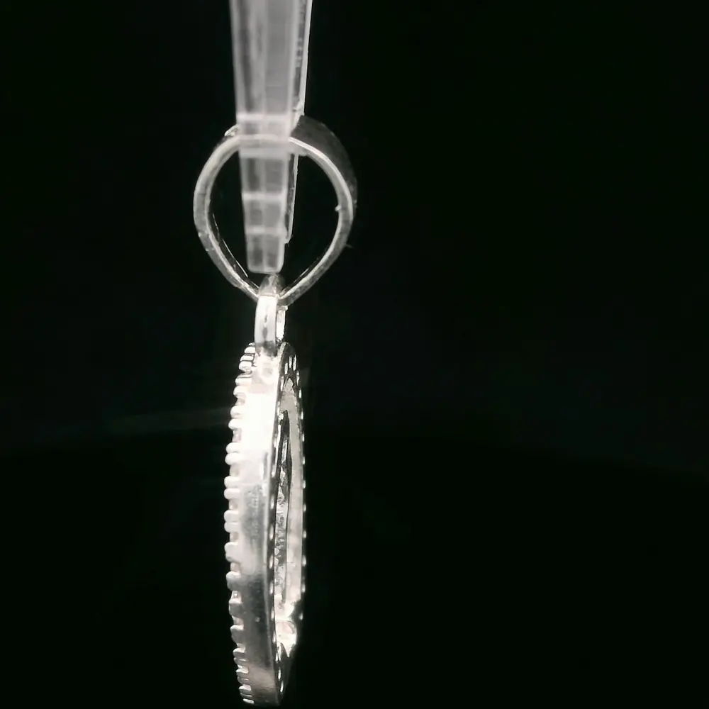 Colgante de Plata Virgen de Guadalupe Troquelada con Halo de Circones