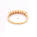 Anillo de Oro Amarillo 18K Cintillo con 7 MCP Fucsias