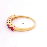Anillo de Oro Amarillo 18K Cintillo con 7 MCP Fucsias