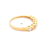 Anillo de Oro Amarillo 18K Cintillo con 4 MCP Incoloras y 3 MCP Champagne