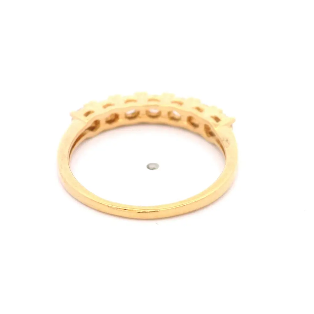 Anillo de Oro Amarillo 18K Cintillo con 4 MCP Incoloras y 3 MCP Champagne