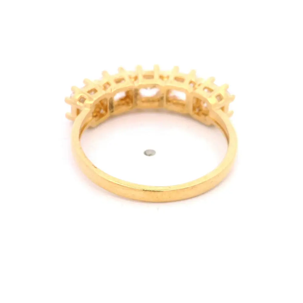 Anillo de Oro Amarillo 18K Cintillo con 5P Incoloras