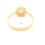 Anillo de Oro Amarillo 18K Flor con 1P Incolora y MCP Incoloras