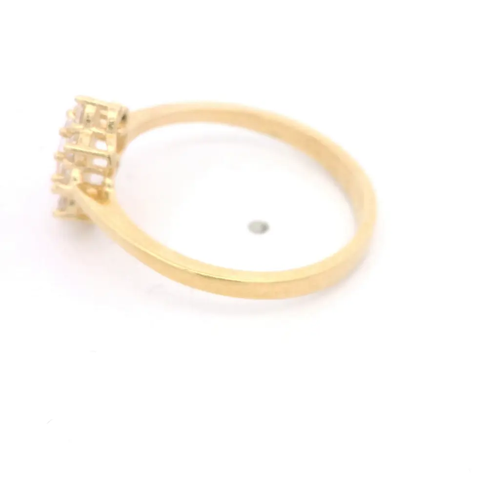 Anillo de Oro Amarillo 18K Cintillo con 4 MCP Incoloras y 3 MCP Champagne