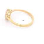 Anillo de Oro Amarillo 18K Cintillo con 4 MCP Incoloras y 3 MCP Champagne