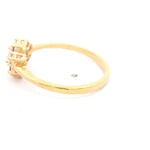 Anillo de Oro Amarillo 18K Flor con 1P Incolora y MCP Incoloras
