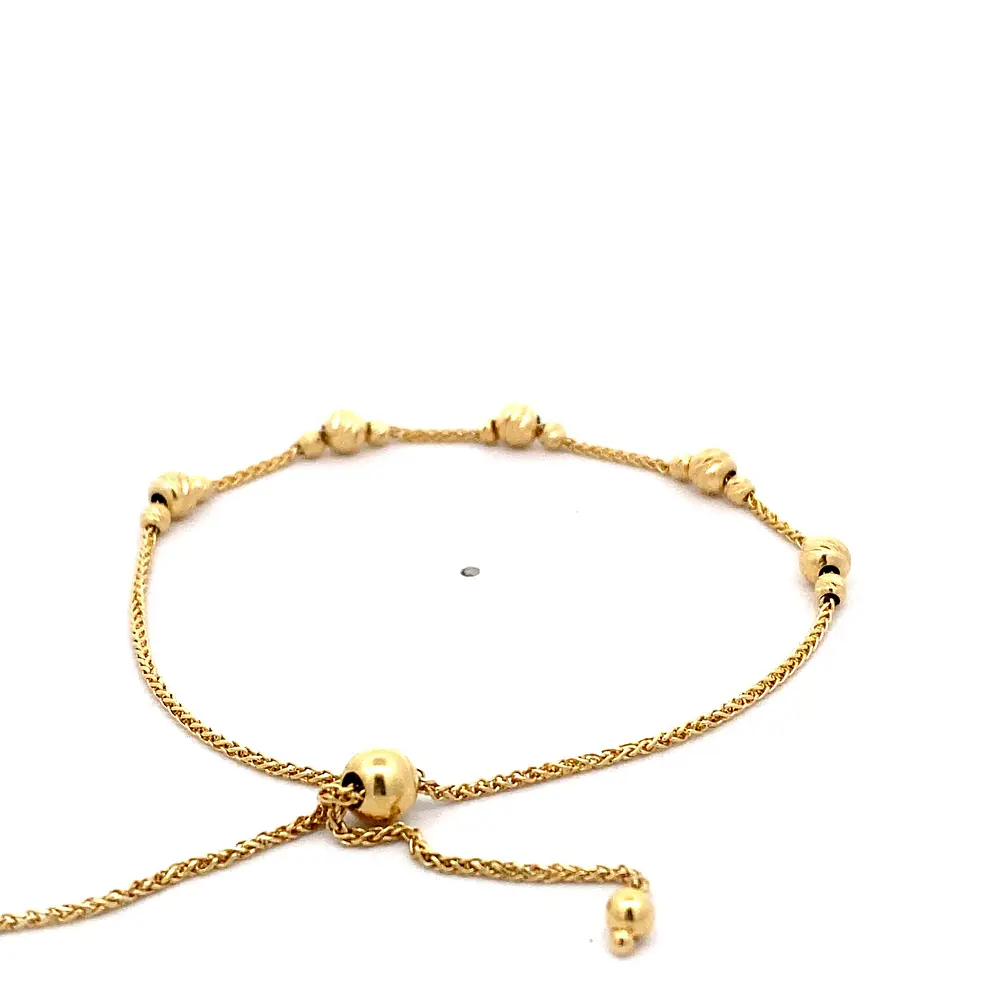 Pulsera Barbada Doble de Oro Amarillo 18K con Esferas Diamantadas