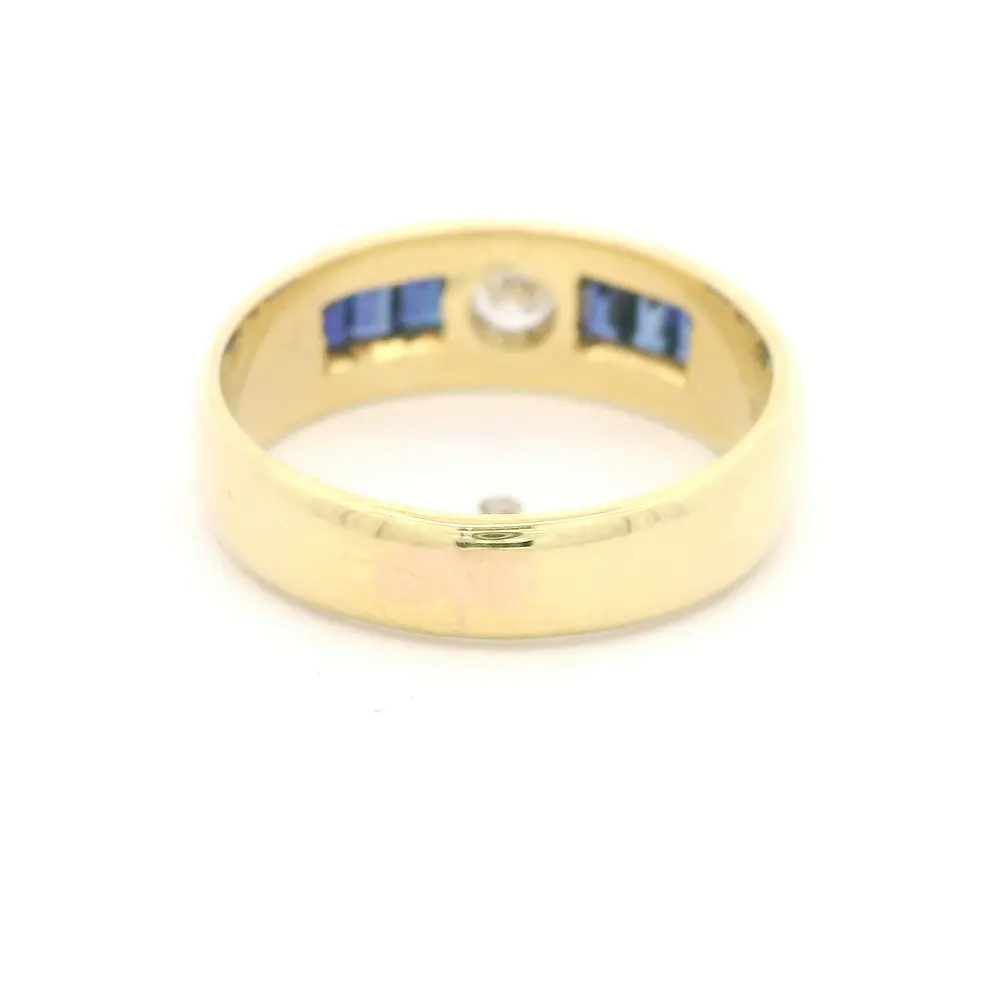 Anillo Bombé de Oro Amarillo 18K con 6 Piedras Azules y Diamante