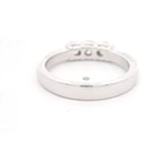 Anillo Cintillo Rodinado de Oro Blanco 18K con 3 Diamantes