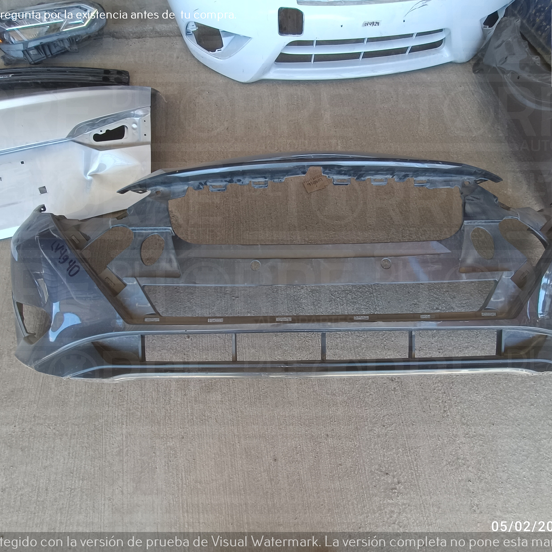 Fascia  de Nissan Versa central, delantero, exterior, superior, 2023 1