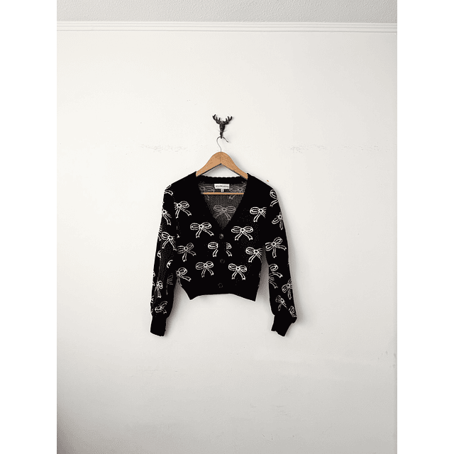 Chaleco moñitos (S)