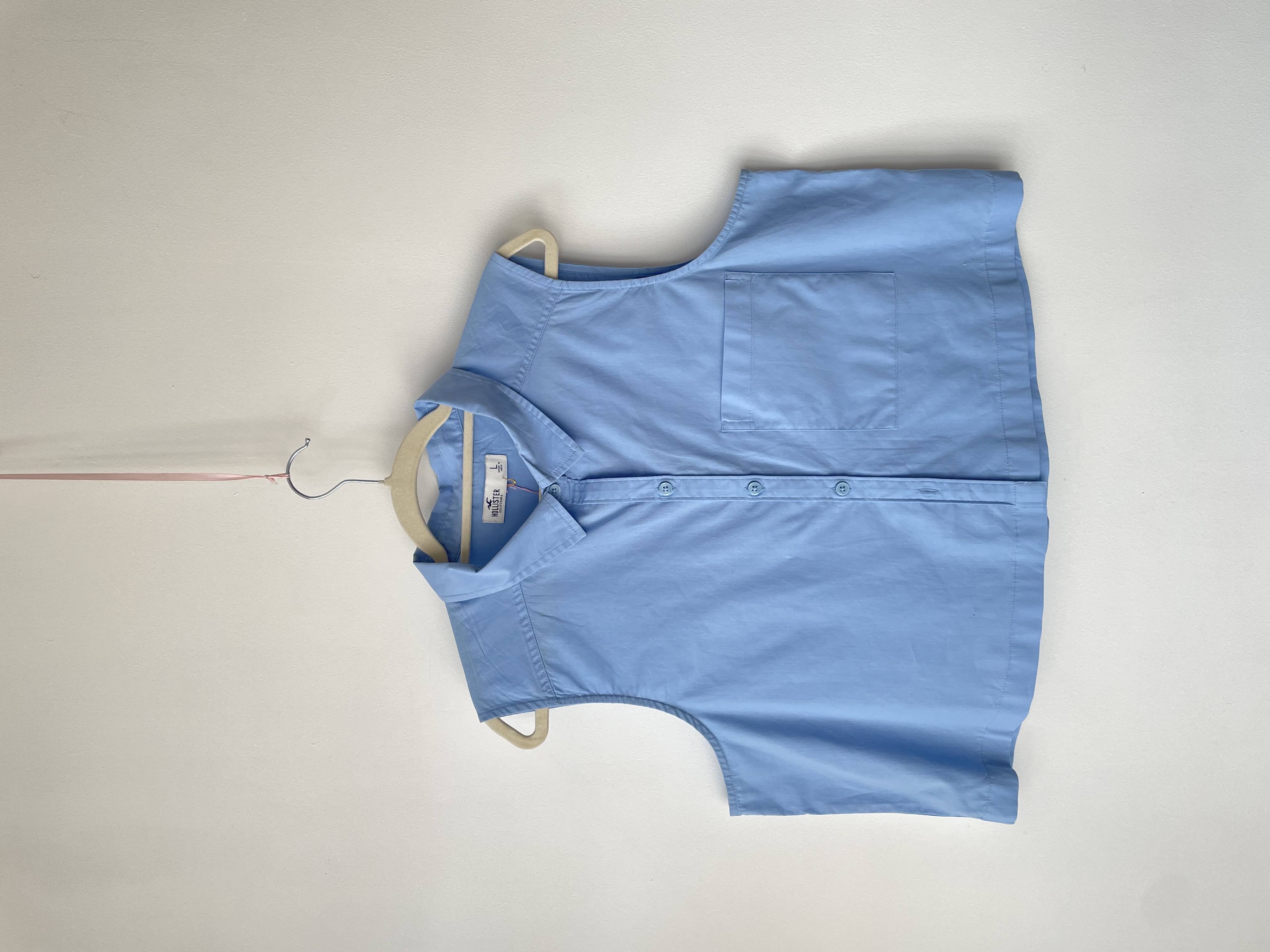 Blusa celeste. Talla: L 1