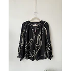 Blusa líneas lava. Talla: M 1