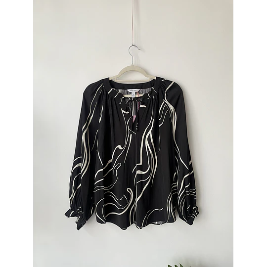 Blusa líneas lava. Talla: M