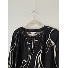 Blusa líneas lava. Talla: M 4