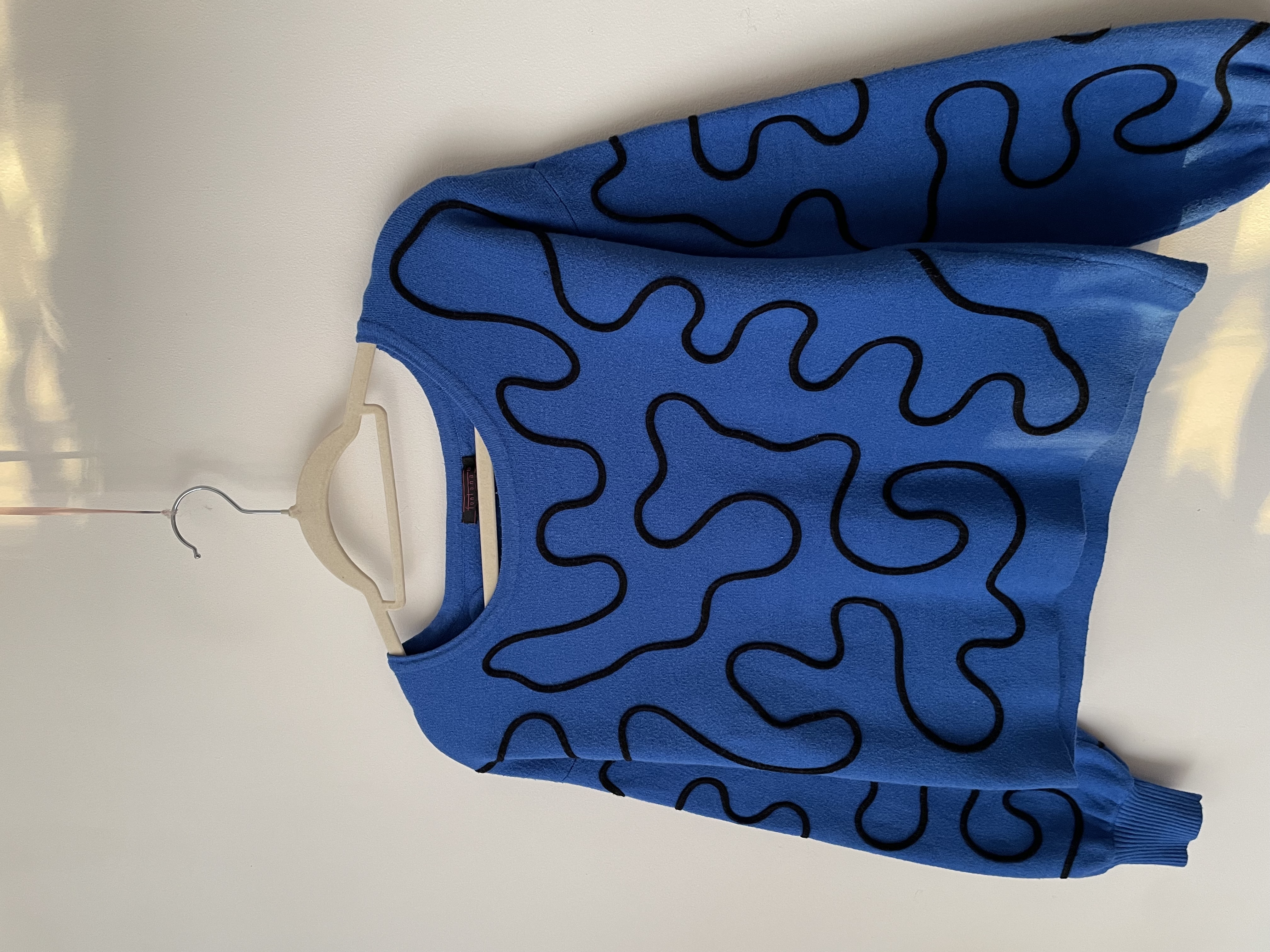 Sweater azul líneas. Talla: S 2