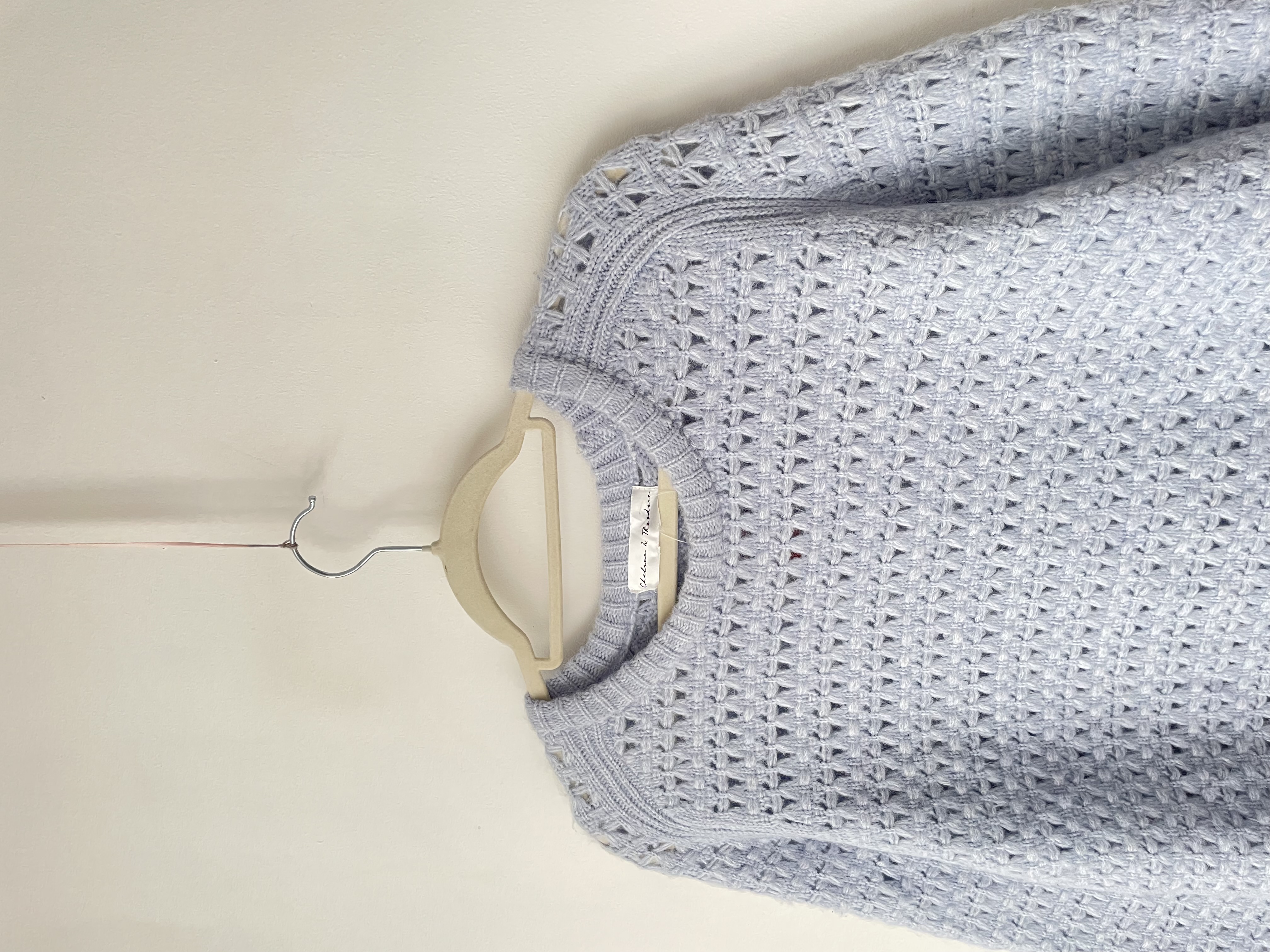 Sweater celeste calado. Talla: M 1