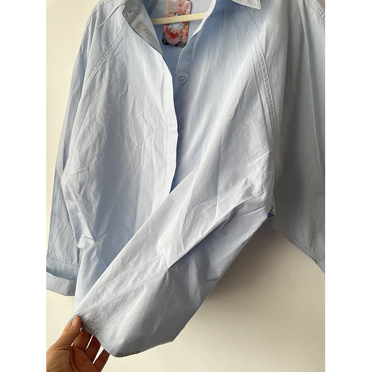 Blusa celeste. Talla: L