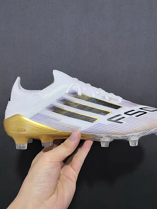 F50 Elite FG com cordões