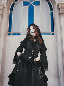 Falda negra ojetillos 