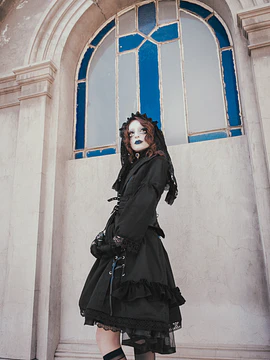 Falda negra ojetillos 