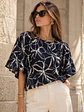 Polera Oversize Mujer Azul Floral Espalda Abierta - Miniatura 1