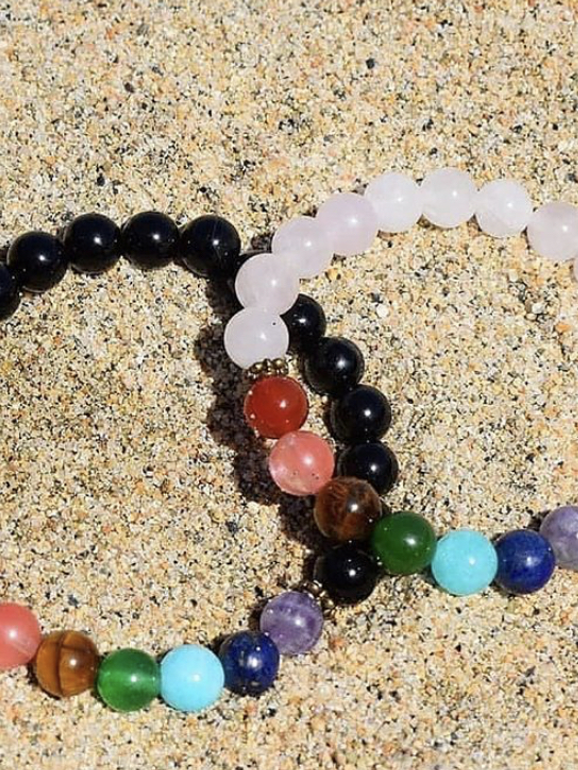 Pack 7 chakras cuarzo rosa y onix negro 1