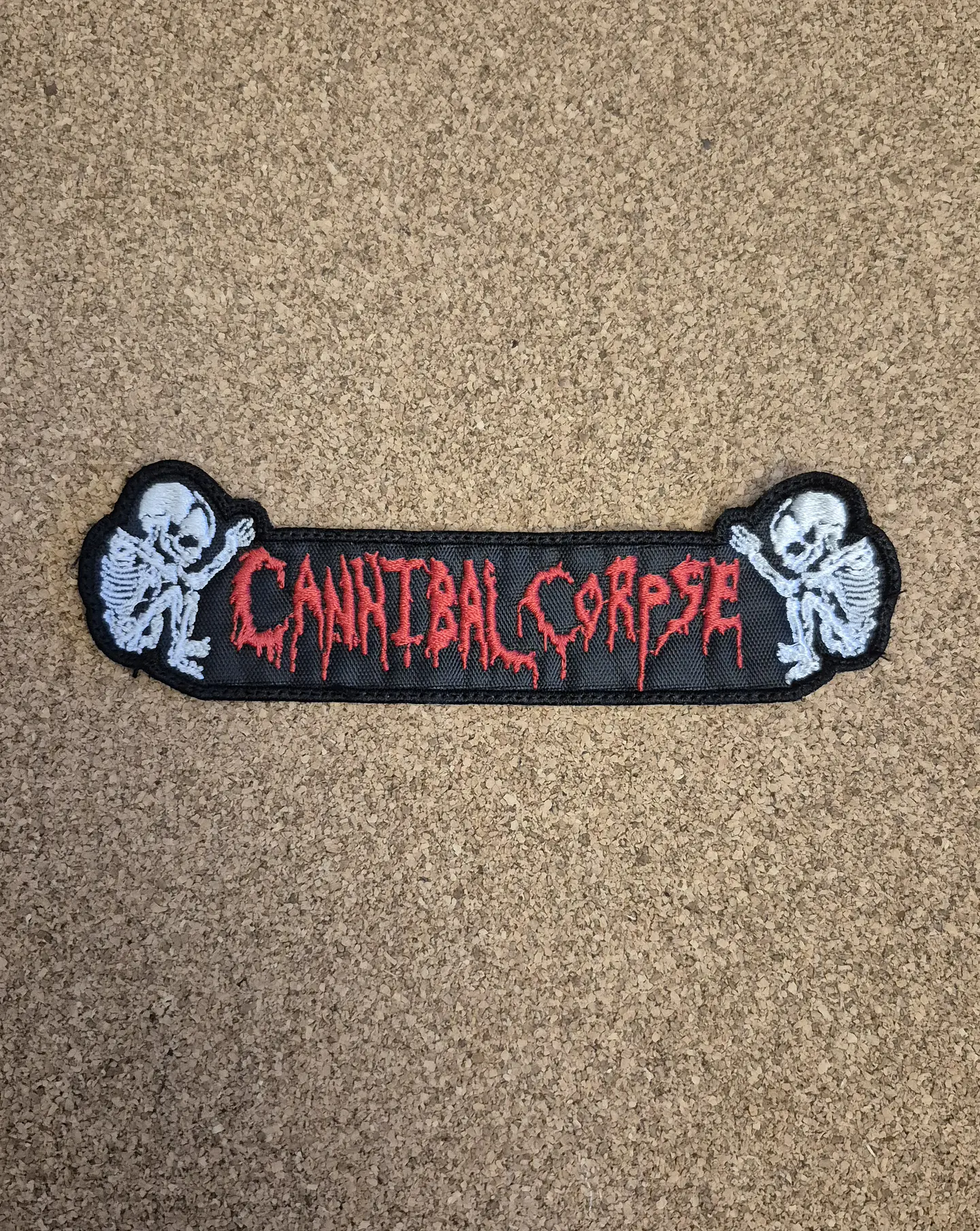 Cannibal Corpse - Skeletons Logo Patch - Embroidered (Sew-On) 1