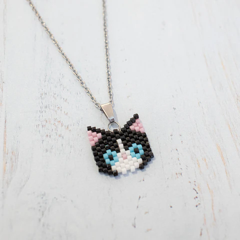 Collar "Gato" blanco, negro, ojos celestes