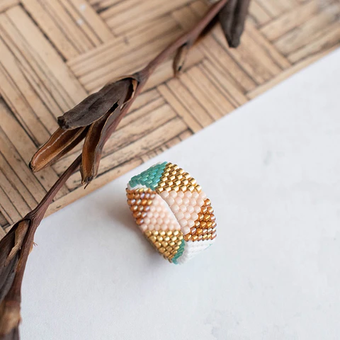Anillo "Boho" turquesa, café y dorado