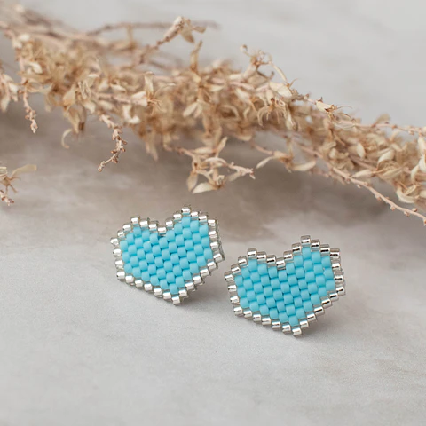 Aros "Corazón" celeste y transparente
