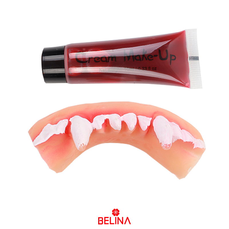 Dientes postizos con sangre artificial
