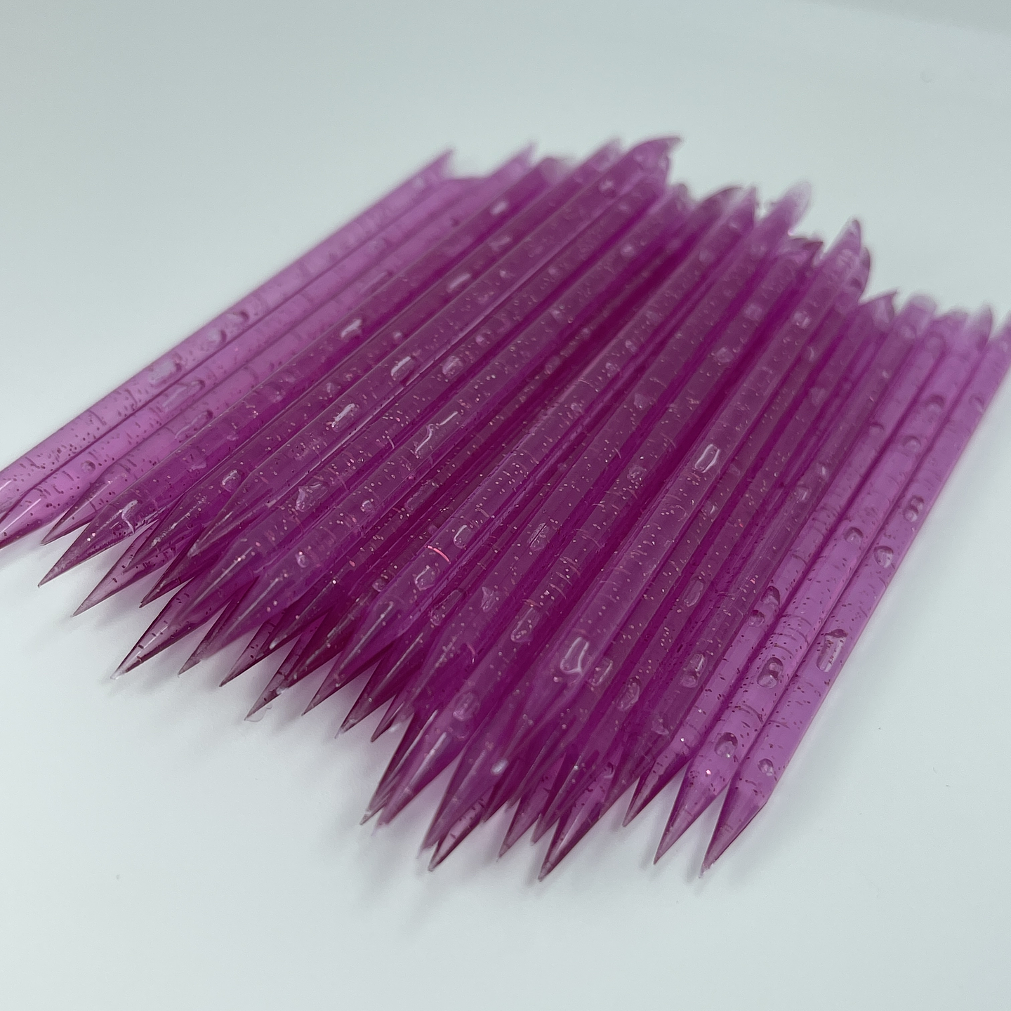 PALITOS DE NARANJO DE PLASTICO 5