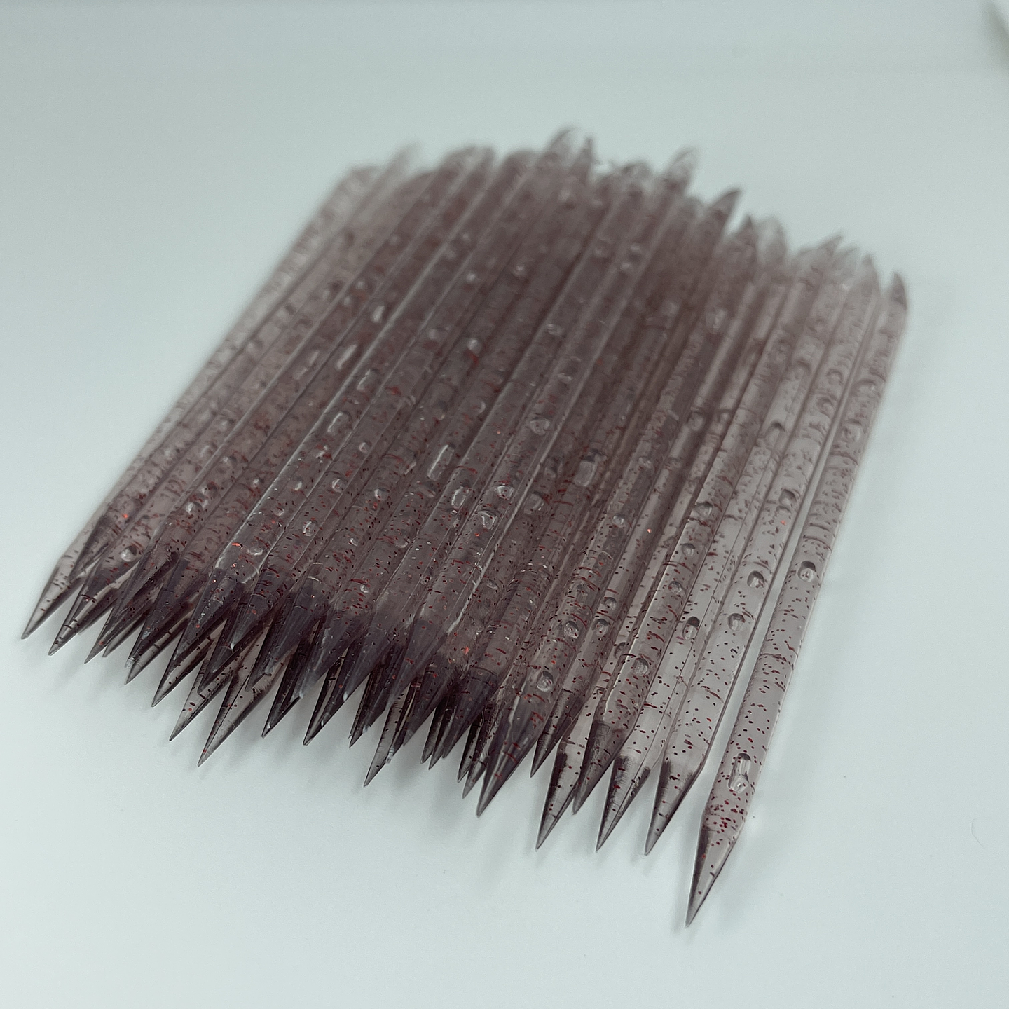 PALITOS DE NARANJO DE PLASTICO 6