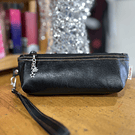 Estuche cartera ecocuero con asa desmontable