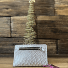 Billetera mini cuero corazon alado plata fucsia 2 cuerpos