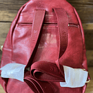 Mochila Lilas rojo con broche dorado