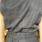 Enterito cruzado botones negro con bolsillos