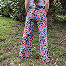 Palazzo lycra floral hojas naranjas 