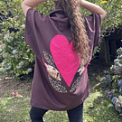 Chaqueton Ultravioleta Paty cafe corazon fucsia con cierre