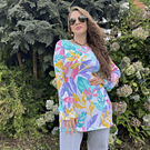 Polera larga lycra blanco floral tonos pastel