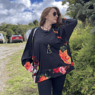 Poleron Ultravioleta Olivia algodon negro floral