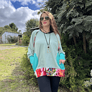 Poleron Ultravioleta Olivia algodon menta blanco floral