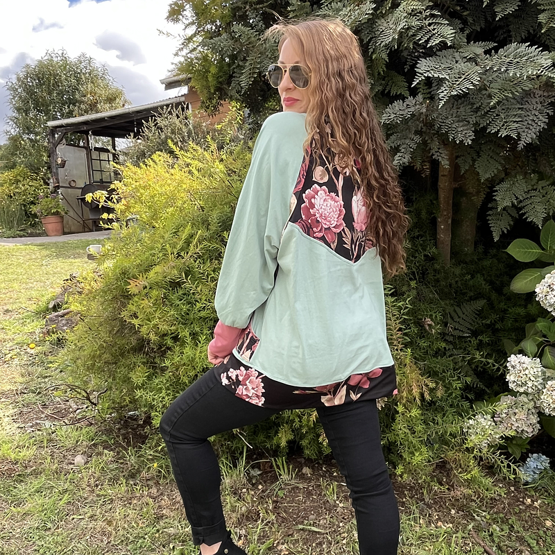 Poleron Ultravioleta Olivia algodon menta negro floral