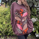 Poleron Ultravioleta Elisa algodon cafe hojas naranja