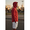 Polerón Under Armour Cage Hombre Rojo con Capucha – Capa Liviana Elástica para Entrenamiento