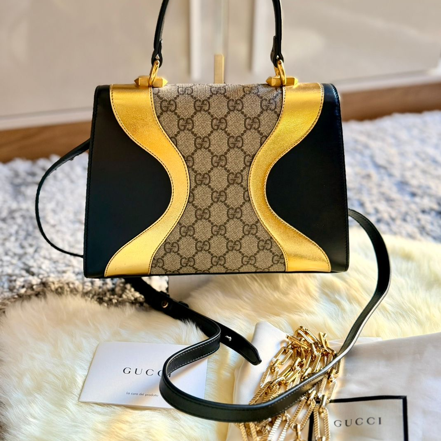 CARTERA DORADA GUCCI 4