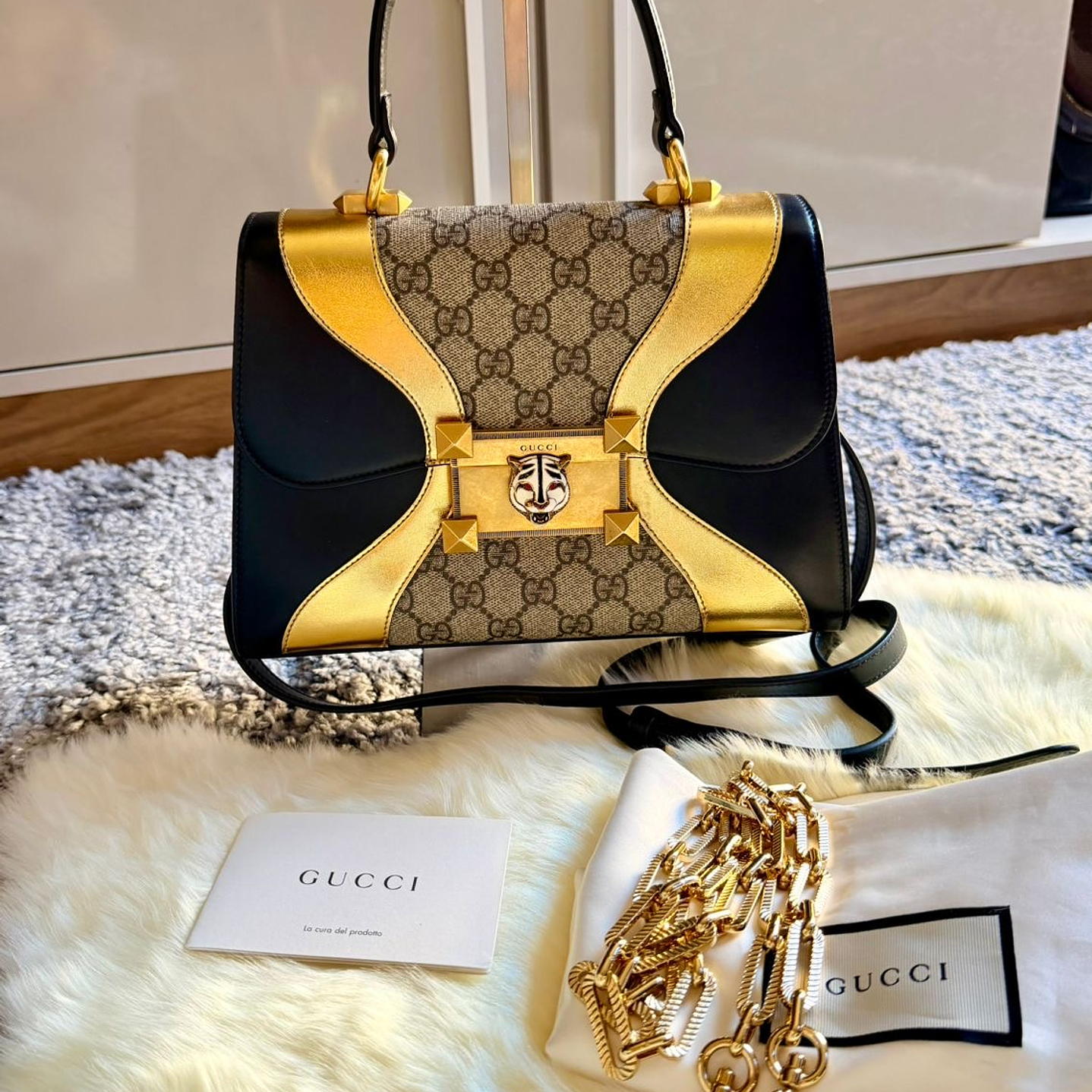 CARTERA DORADA GUCCI 6