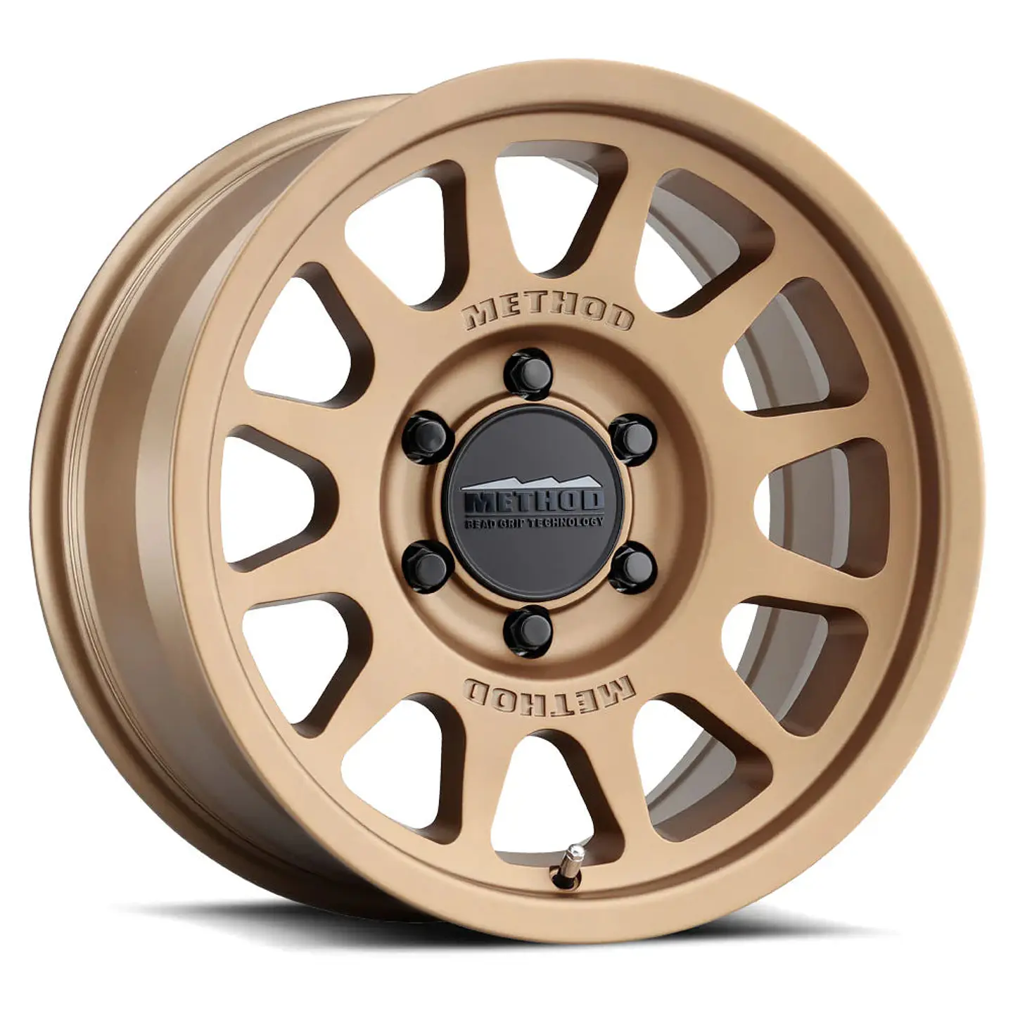 Juego de 4 llantas Method MR703 17x9 6x139.7 ET -12 Bronze Beadgrip 1