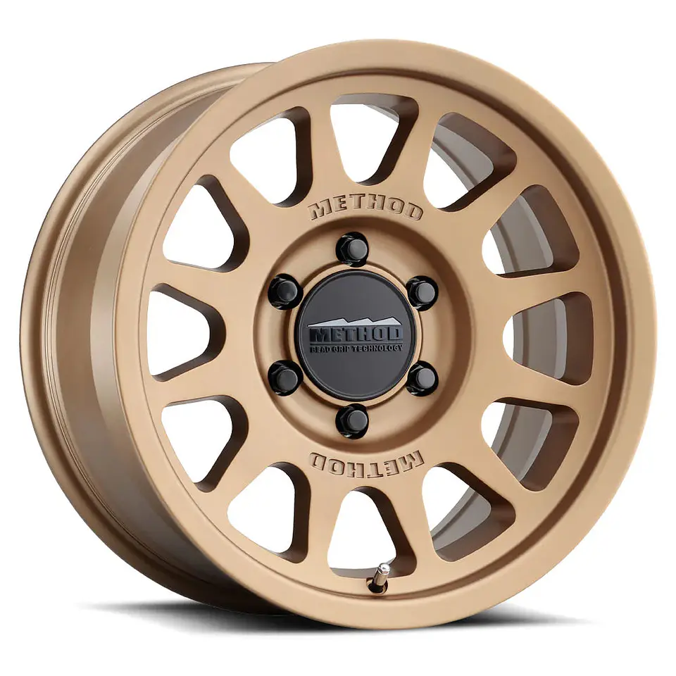 Juego de 4 llantas Method MR703 17x9 6x139.7 ET -12 Bronze Beadgrip 1